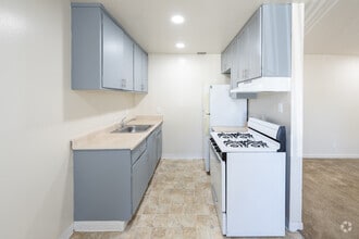 Building Photo - Holiday Orchard Apartments