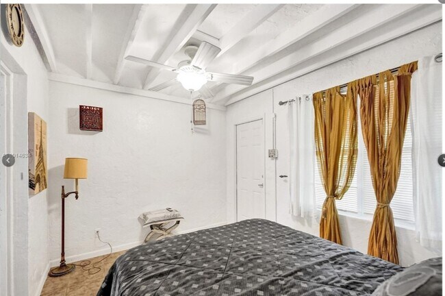 View of Bedroom, which also has an exit. - 213 SW 2nd Ave