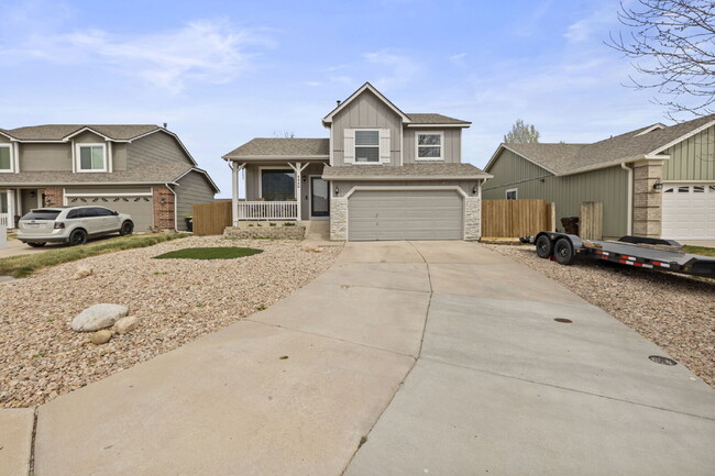 Photo - Spacious 4-Bedroom Home with Fenced Yard, 2-Car Garage & Scenic Views in Cheyenne Meadows