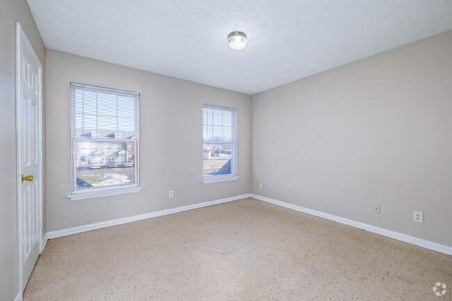 2BR, 2BA - 900SF - Primary Bedroom - Meadow Creek Townhomes