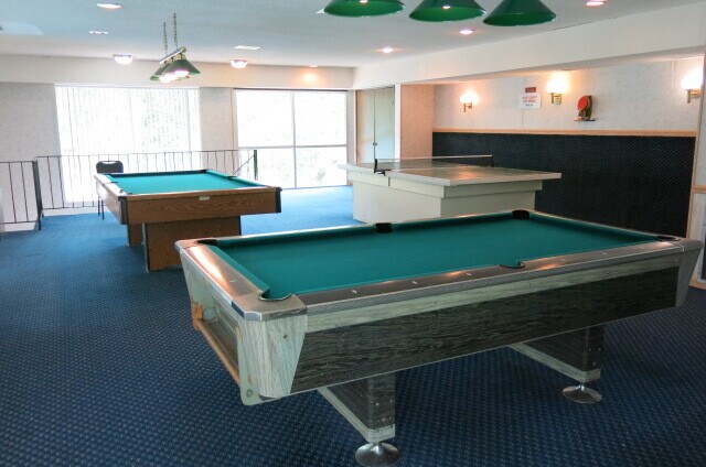 Community pool & ping pong tables in recreation center. - 10840 Rockford Road