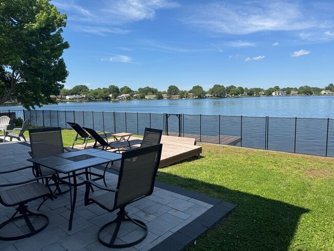 Building Photo - Lake Front Living-Four Bedroom Three and a...
