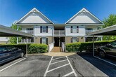 Top floor, vaulted ceilings with covered parking. - 4302 Spring Creek Ln