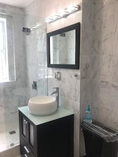 Pasha Porcelain tiles. Custom Rain Shower - 4633 Park Ave