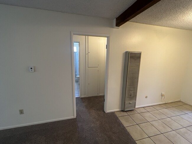 Hallway leading to bedrooms, bathrooms and laundry area - 3262 Montrose Ave