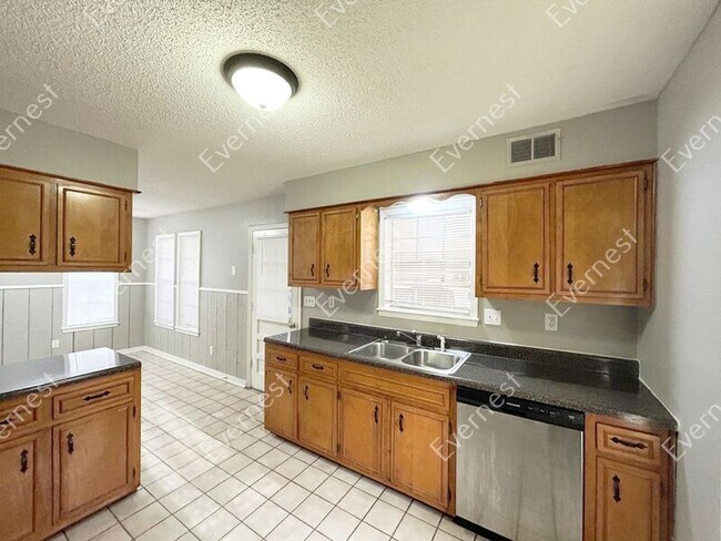 Building Photo - 8074 Steven Franklin Dr