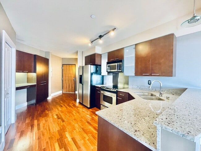 Building Photo - Stunning Top Floor Condo on Denny Way with...