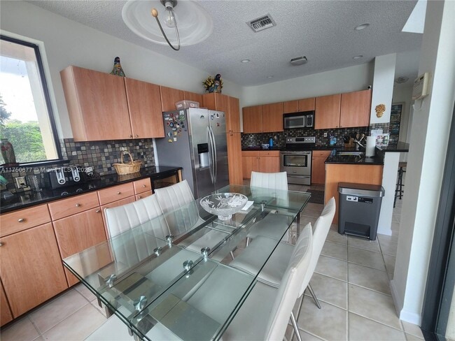 Building Photo - 10680 Avenida Santa Ana