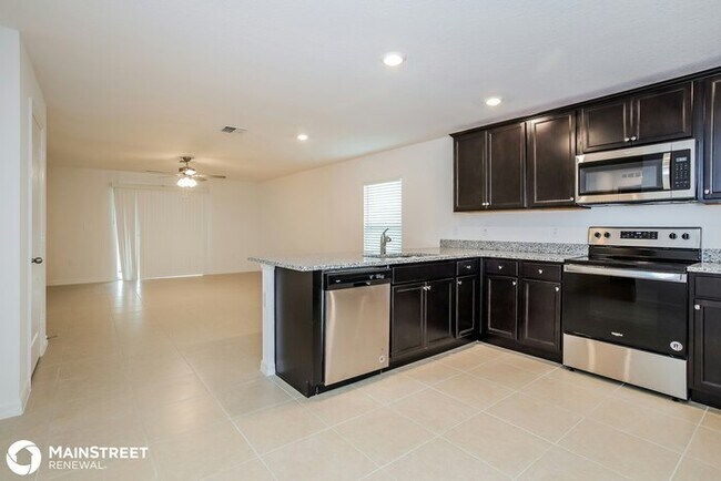 Building Photo - 1736 Canaan Loop, Dundee, FL 33838