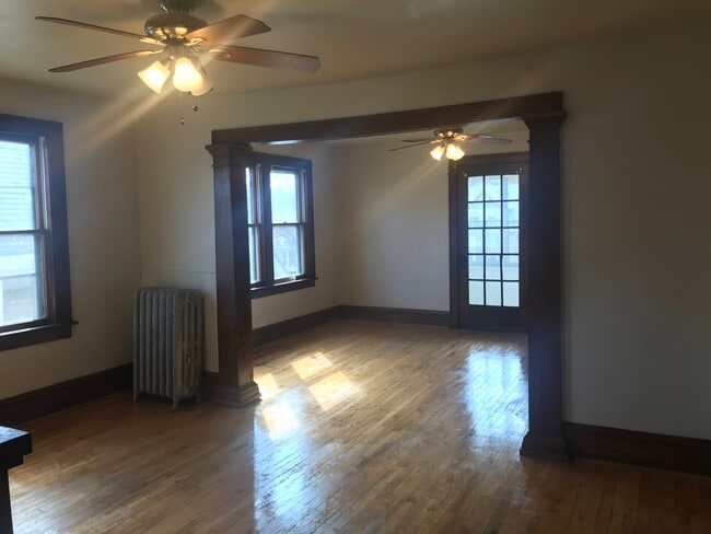 Standing in dining room, looking into living - 2917 S 31st Ave