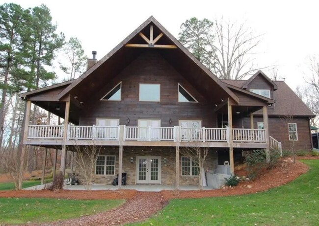 Front of house. Apartment located 1st floor basement. - 7225 Ledbetter Rd