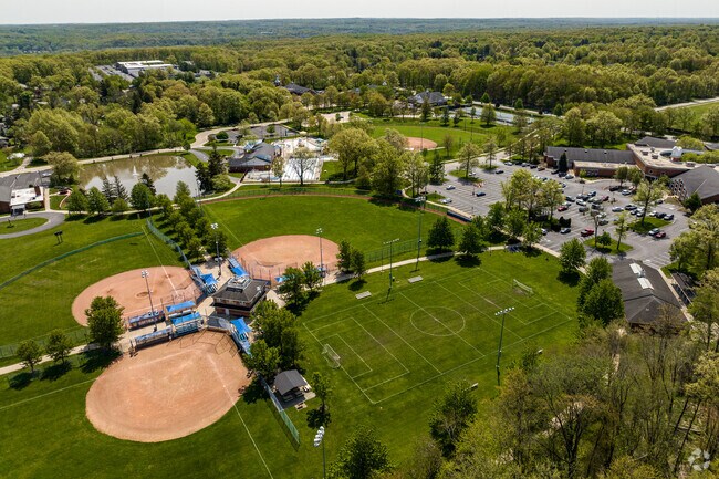 Elmwood Park has multiple playgrounds, baseball fields, soccer fields, a fishing pond, an outdoor pool, and many other amenities.