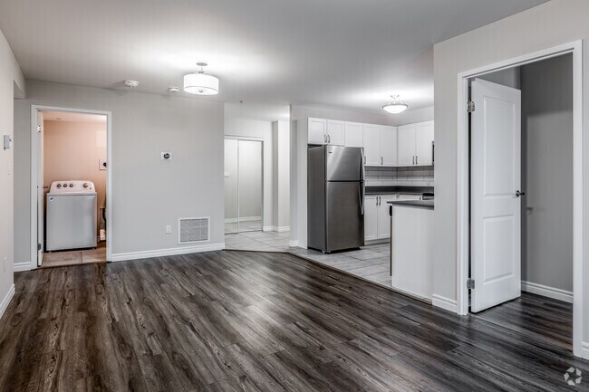3BR, 2BA - 1,266SF - Living Room - 220 Ira Needles Blvd