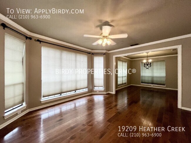 Building Photo - "Spacious 5-Bedroom Home with Fireplace in...
