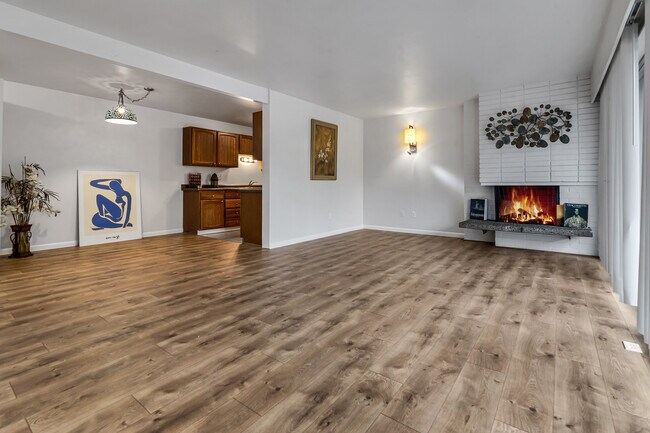 Living room with wood burning fire place - 2500 81st Ave SE
