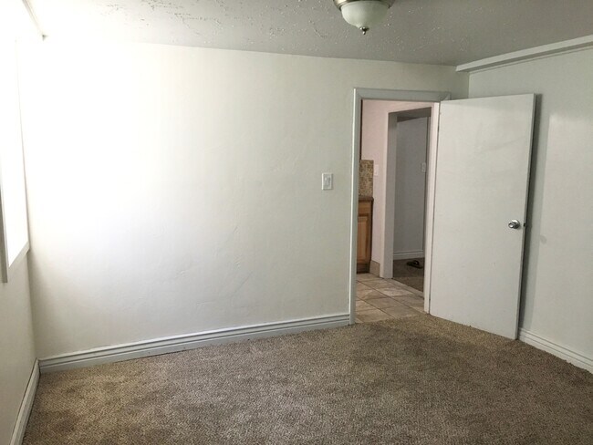 Bedroom doorway into kitchen - 4245 Highland Drive