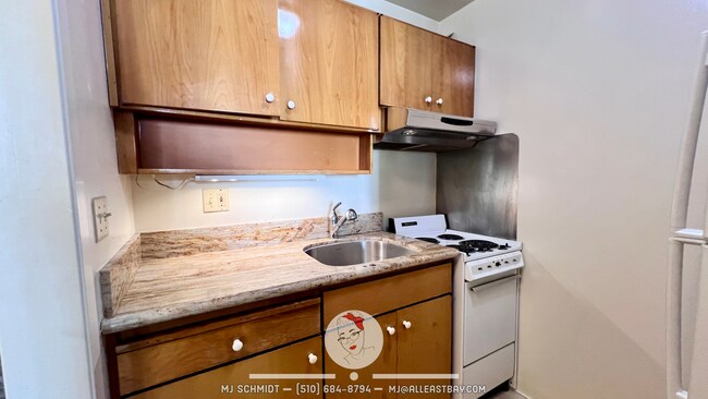 Building Photo - Lovely Studio with Walk Out patio includes...