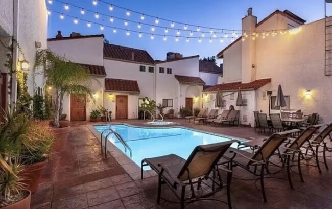 Nighttime pool ambiance - 10926 Bluffside Dr