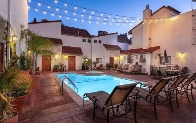 Nighttime pool ambiance - 10926 Bluffside Dr