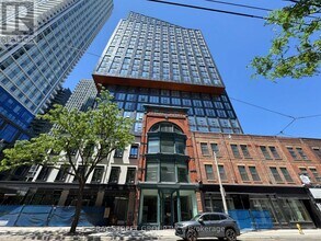 Building Photo - 100 Queen St E