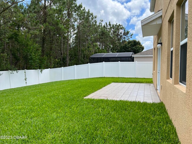 Foto del edificio - 5266 Plantation Home Way
