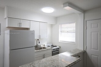 Building Photo - 1235 W 66th St