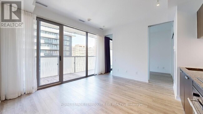 Building Photo - 50A-1050 Charles St E