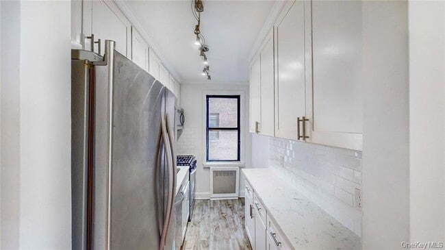 Photo - 66-15 Wetherole St Apartment
