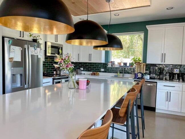Kitchen with high end appliances & jumbo island - 1907 Greenwood Ave