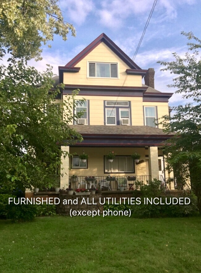 Front of triplex. - 7120 McClure Ave