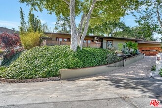 Building Photo - 15511 Woodcrest Dr