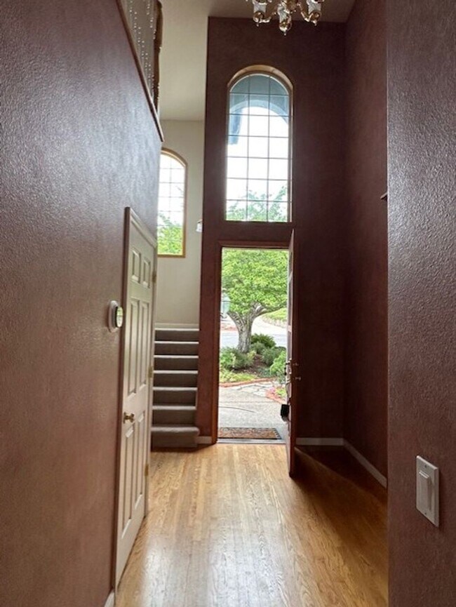 Building Photo - Custom-Built Home with Vaulted Ceilings and Daylight Basement