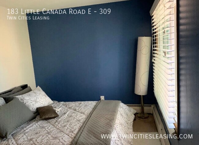 Building Photo - Amenities include a pool, sauna, garage pa...