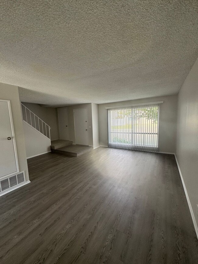 Building Photo - COMING SOON! 3 Bed + 1.5 Bath Townhouse