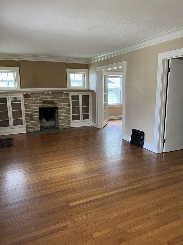 Living room with fireplace and original built-ins - 5011 Virginia Ave