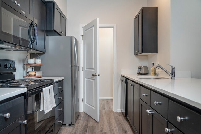 1x1 Deluxe l Model Kitchen - 1500 Orchard Apartments