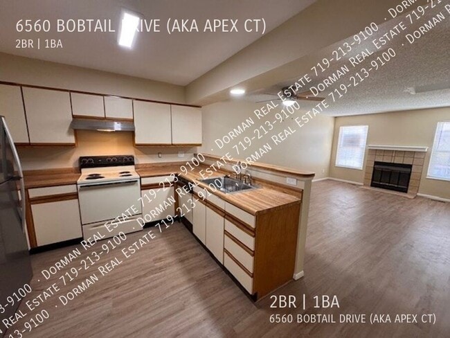 Building Photo - 6560 Bobtail Dr