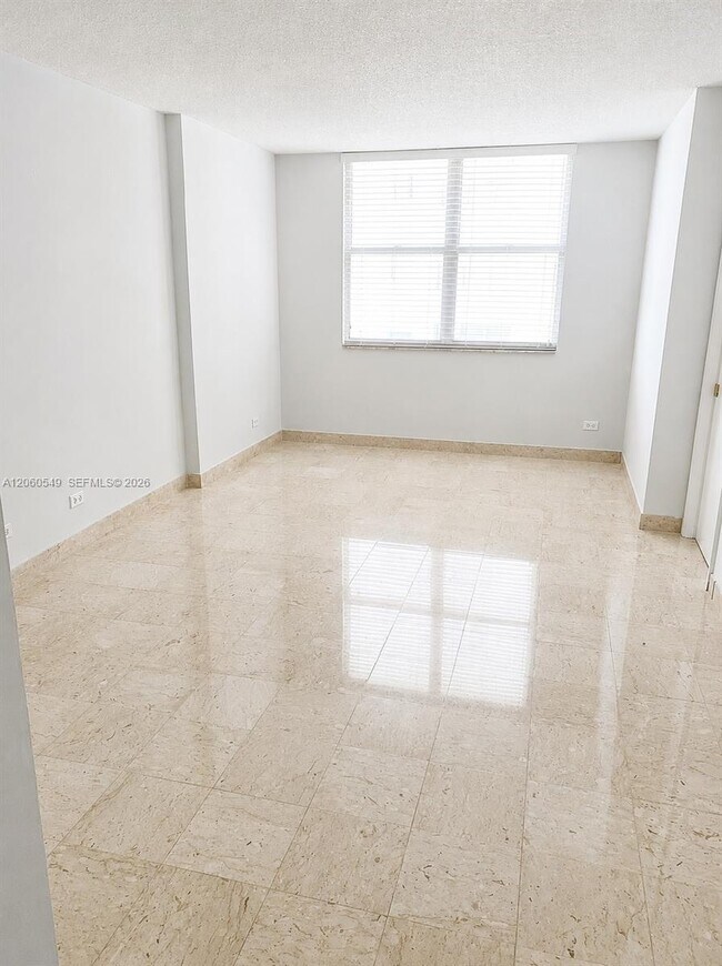 Building Photo - 6039 Collins Ave