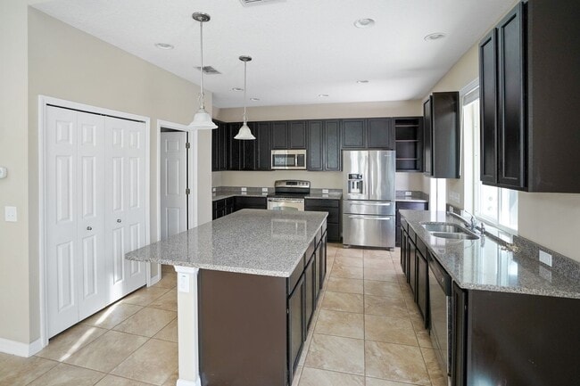 Photo - Spacious 4BR in Harmony w/ 2 Primary Suites House