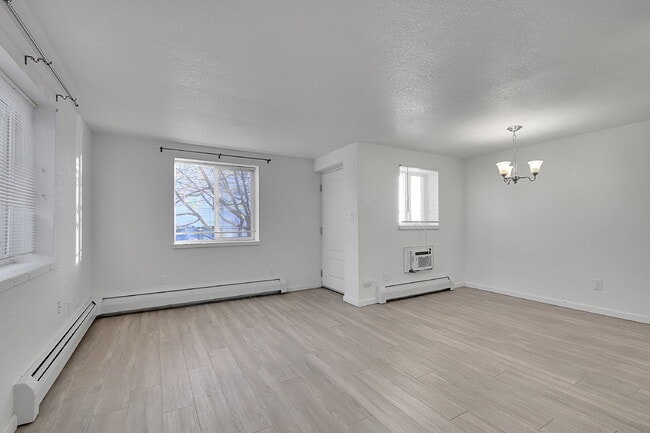 Building Photo - $1,470.95  - 2 Bedrooms, 1 Bathroom, Condo in Denver with Cozy Carpet!