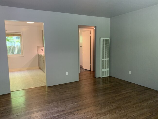 View from the front door looking into the kitchen on the left and the hallway to bathroom at right. - 1624 T St