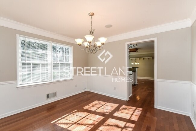 Building Photo - REDUCED!- Now offering $1000 off first ful...