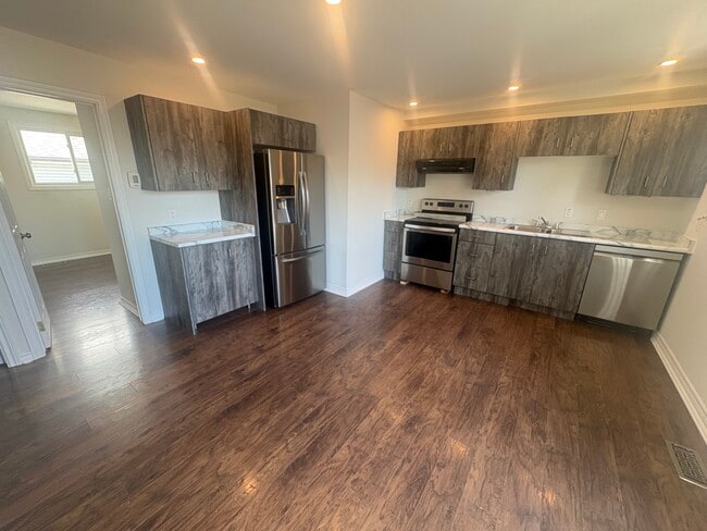 Building Photo - 3 Bedroom Unit