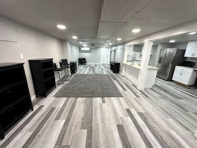Building Photo - 1st Rent Month Free!! Stunning Partially F...