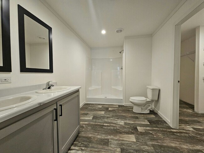 Foto del edificio - 6710 Hidden Oaks Dr