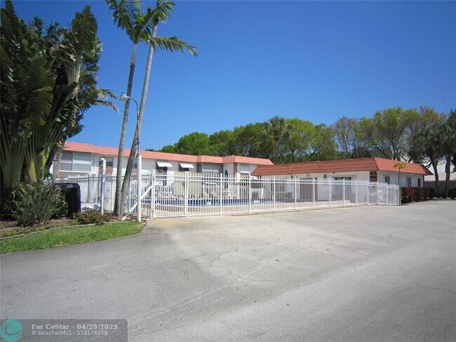Building Photo - 3550 NW 8th Ave