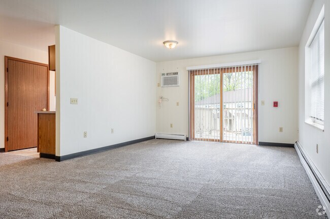 2 habitaciones, 1 baño - 950 pies cuadrados - Sala de estar - Sylvan Glen Apartments