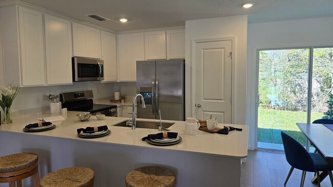 Foto del edificio - 6821 Lake Mist Ln