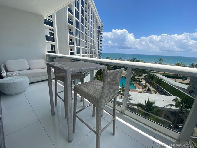 Building Photo - 10275 Collins Ave