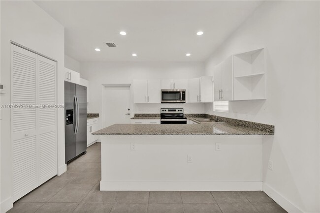 Building Photo - 6331 NW 1st Pl